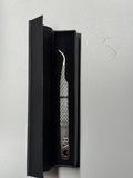 Curved isolation tweezer